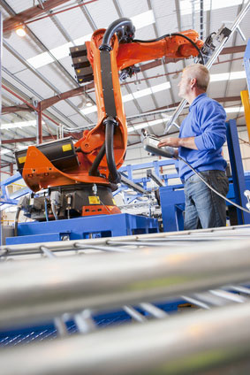 Robot and worker working side by side 