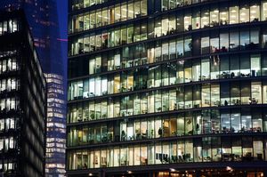 Multistorey-building by night with illuminated windows