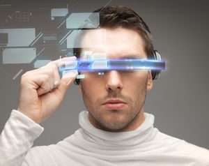 Man looks through data glasses