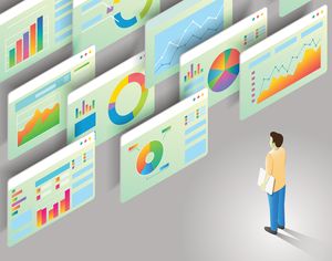 Un homme regarde des écrans qui montrent différents diagrammes