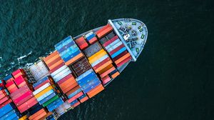 Container ship at sea seen from above