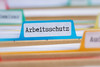 Akte mit der Beschriftung Arbeitsschutz