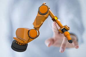 Ein Finger berührt einen kollaborierenden Roboter