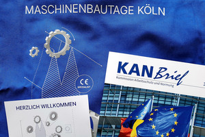 Blaue Stoffunterlage mit Hinweis auf die Maschinenbautage in Köln, eine Willkommenspostkarte und ein KANBrief.